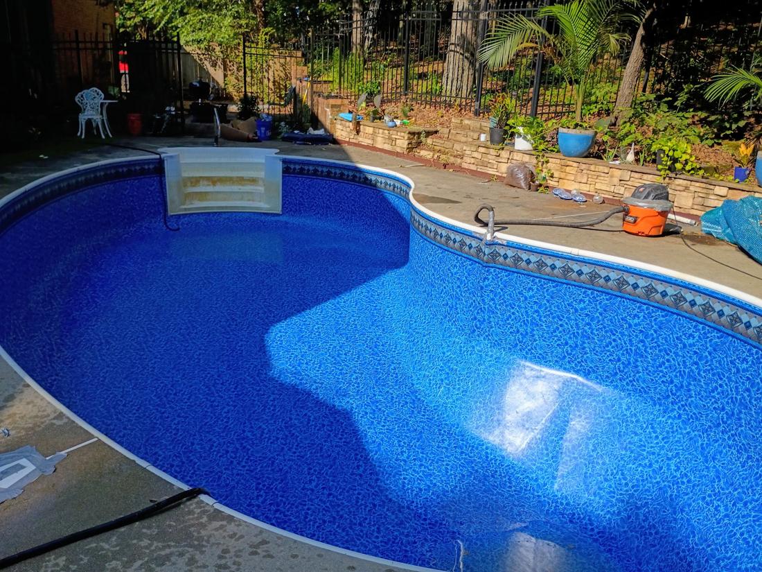 New liner set with the diamond border tile, toward the steps
