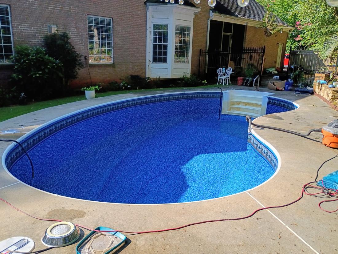 New liner vacuumed in, seen toward the house