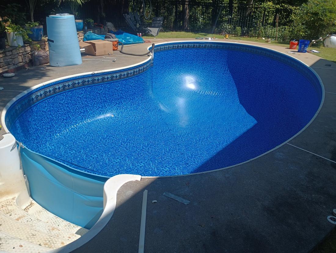 New liner vacuumed in from the steps end