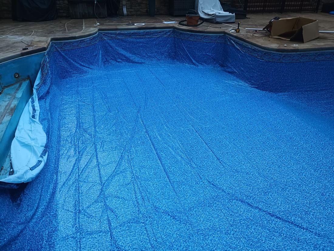 New liner hung with the mosaic border around the bench