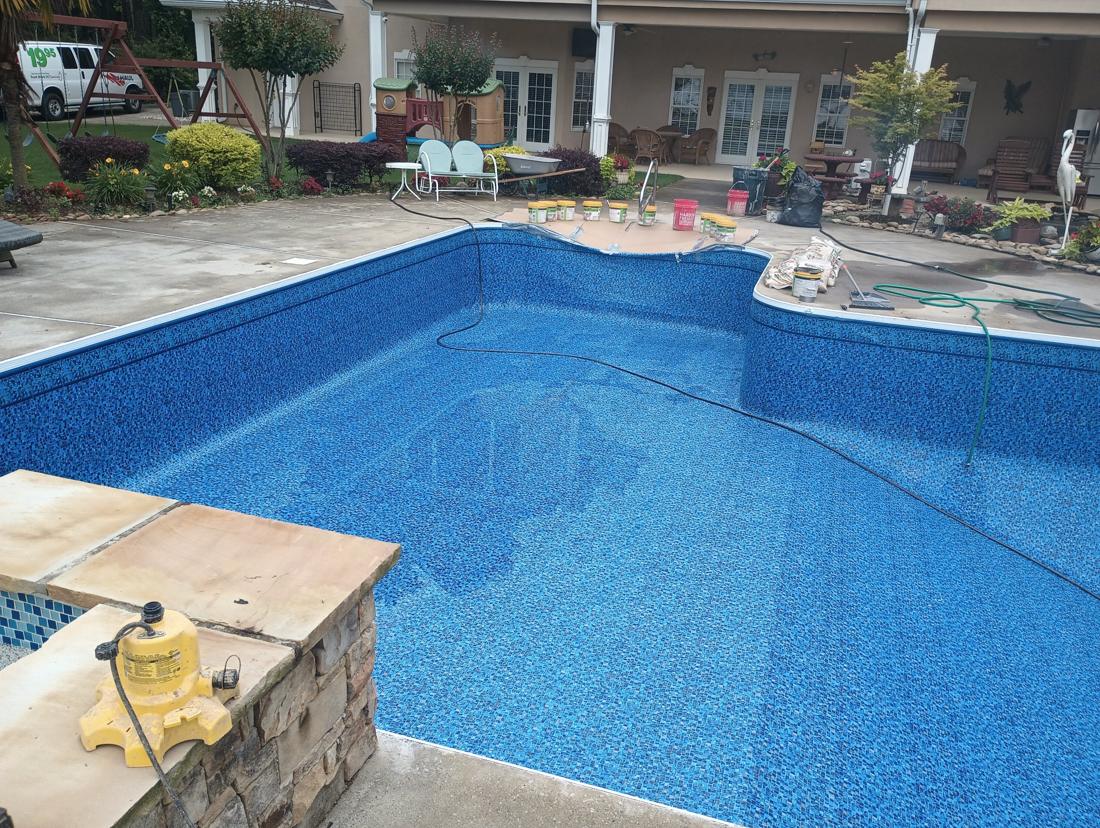 New liner around the shallow-end step area