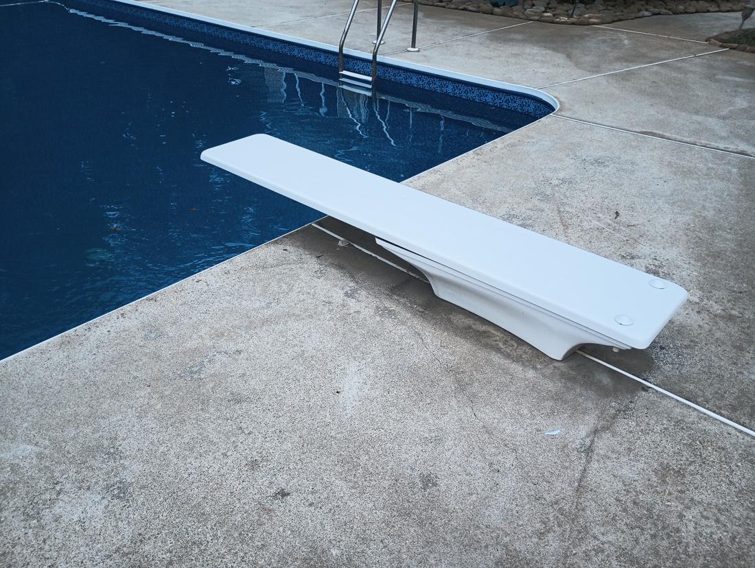 Diving board over the deep end with the new liner