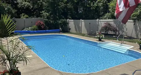 Serene Tile Honey Pearl Floor vinyl liner installed in a real pool